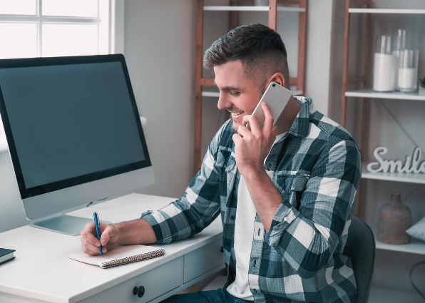 man-over-the-phone-writing